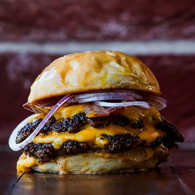 A cheeseburger ready to eat